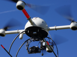 The Microdrone multi-rotor UAV with camera and gimbal in flight. Credit: ICARUS.
