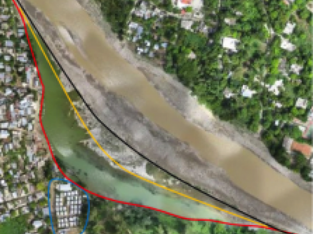 Figure 5: The Grey River around IDP camp St-Étienne. © IOM