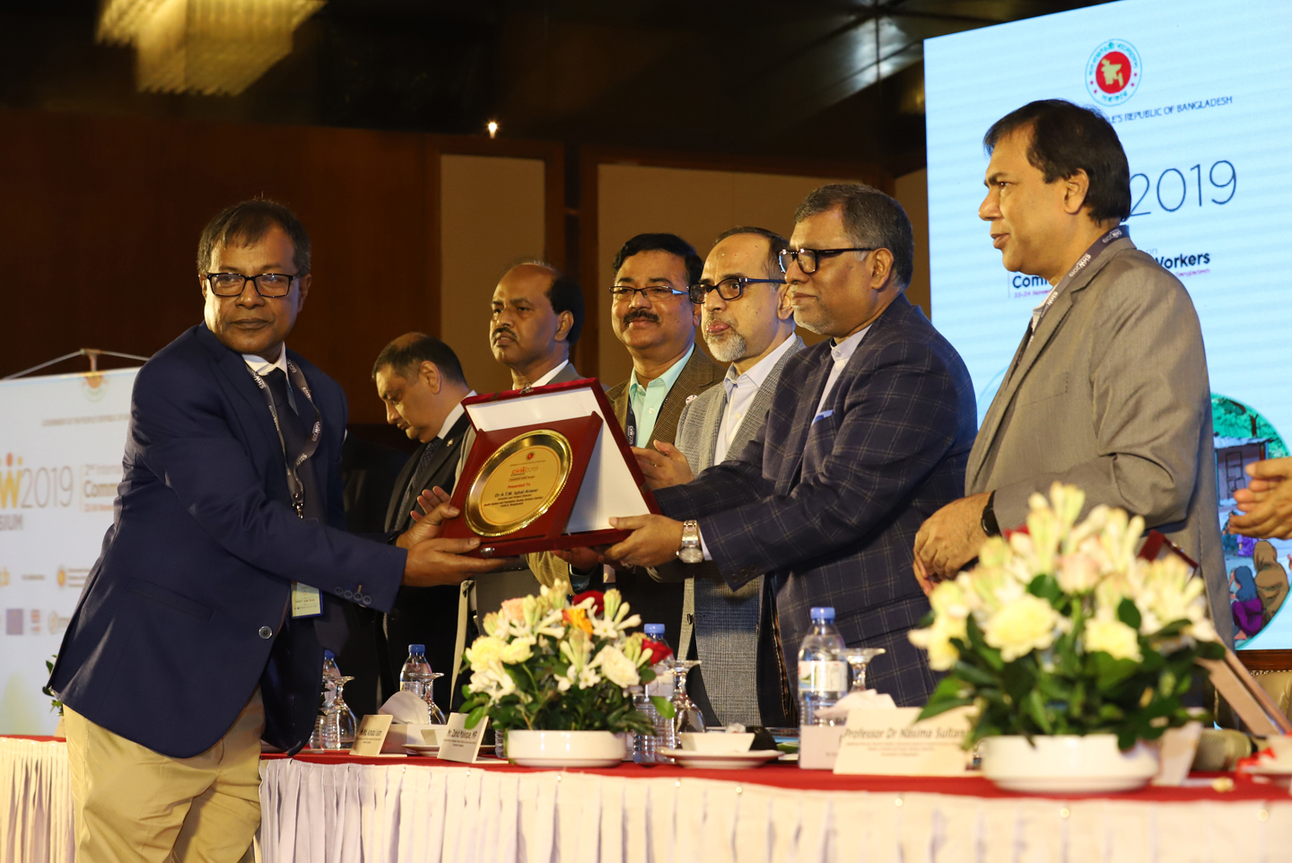 Dr Iqbal Anwar, Scientist and Project Director of icddr,b received a crest from Chief Guest of Closing Ceremony of the Symposium, Mr. Zahid Malek, MP, Health Minister, MOHFW for his contribution to make the Symposium successful.