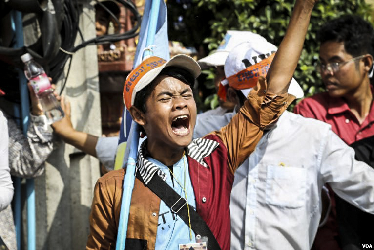 A young protester screams for Prime Minister to step down on the final day of a three-day rally by the opposition.