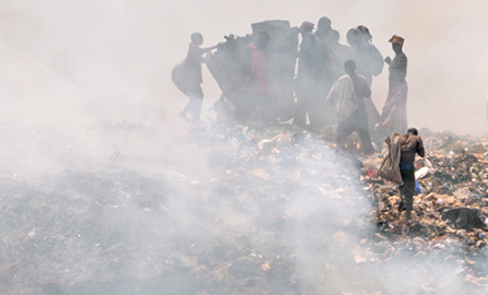 People collect waste in a dump, Bamako, Mali