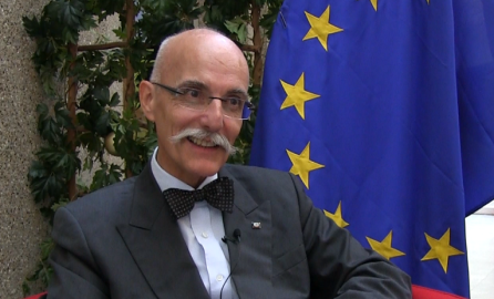Photo of Jean-Francois Cautain as the Head of Delegation to Pakistan with EU flag as the background