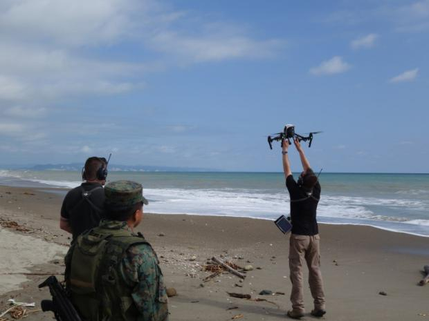 Aerovision drone pilot launching a Phantom 1 pro. Photo: Aerovision