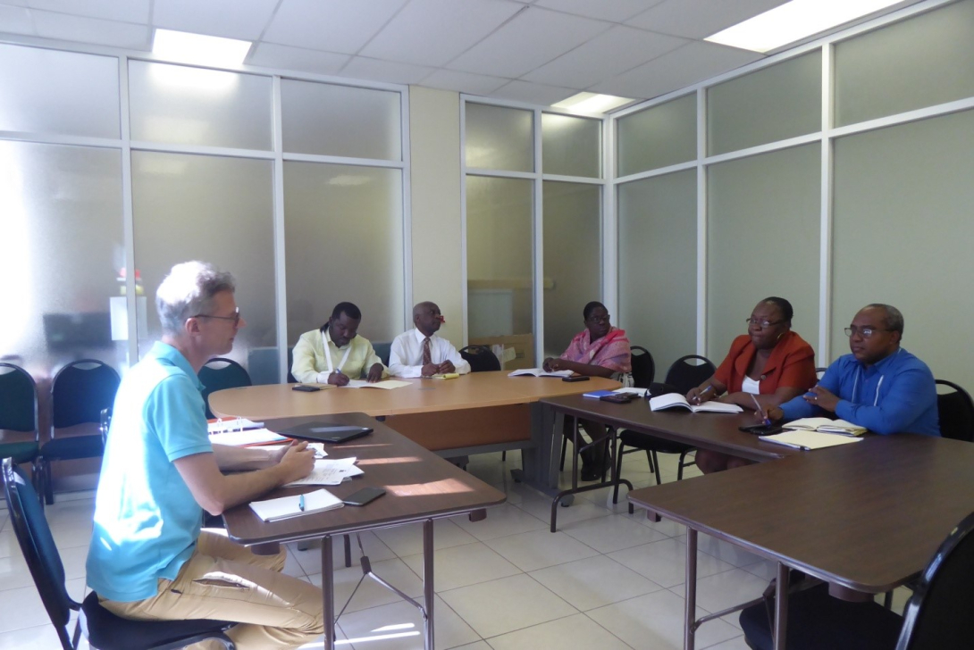 The evaluator, Mr. Christian Grau, discussing with members of the project team during a meeting at the LNSP