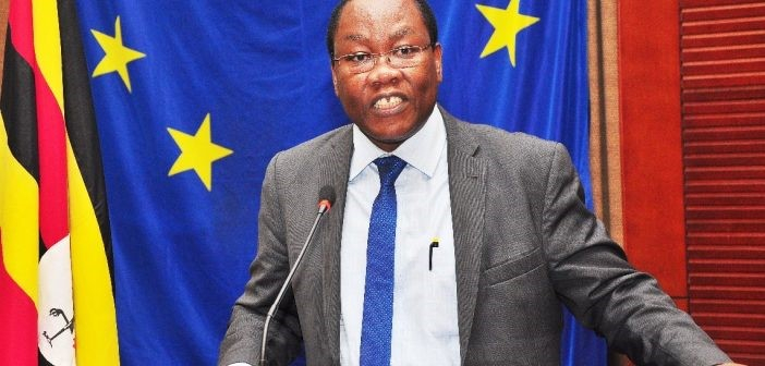 Associate Professor Freddie Ssengooba speaking at the event