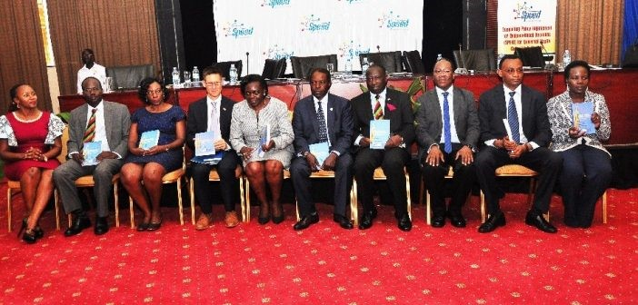 The UHC Book editors pose for a group photo with the dignitaries after the launch ceremony