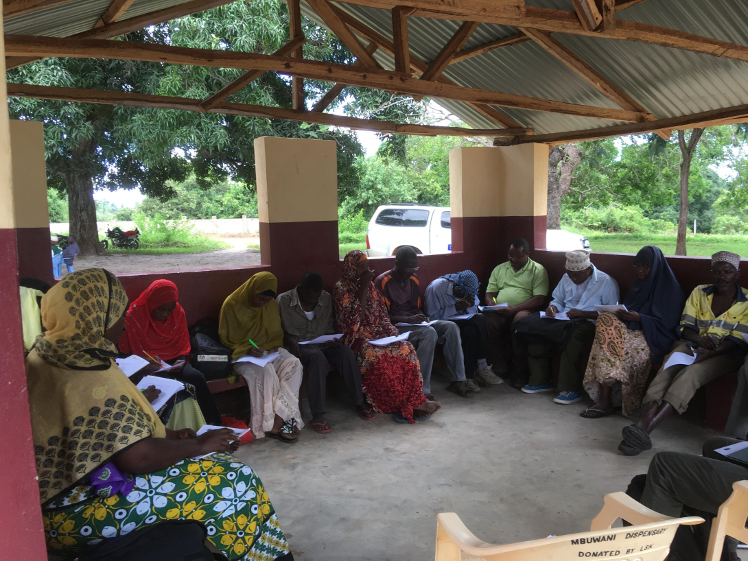 Community Health Volunteers answering questionaires