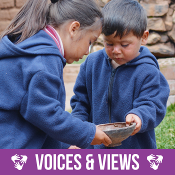 Little Latin Siblings Holding Empty Dishes