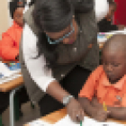 teacher with pupil