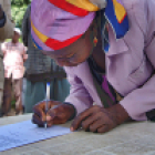 Woman signing a contract