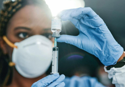 Nurse preparing a vaccine