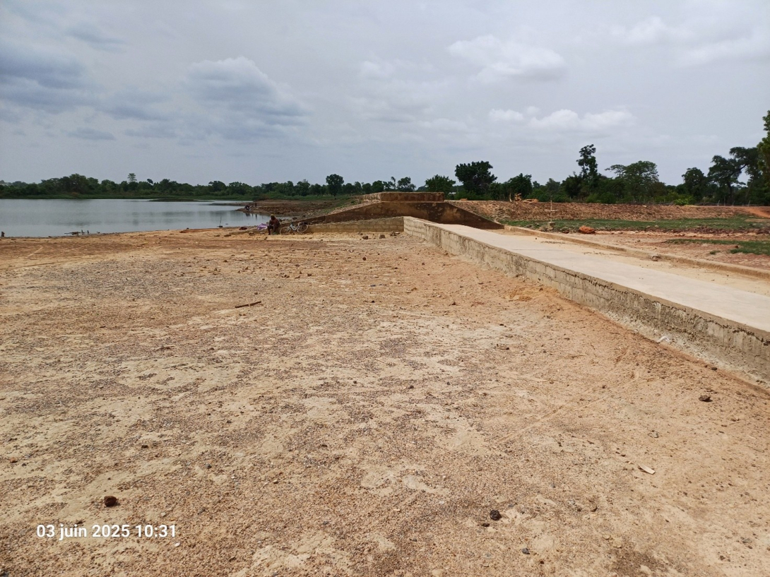 view of a reservoir and renewed dam structure